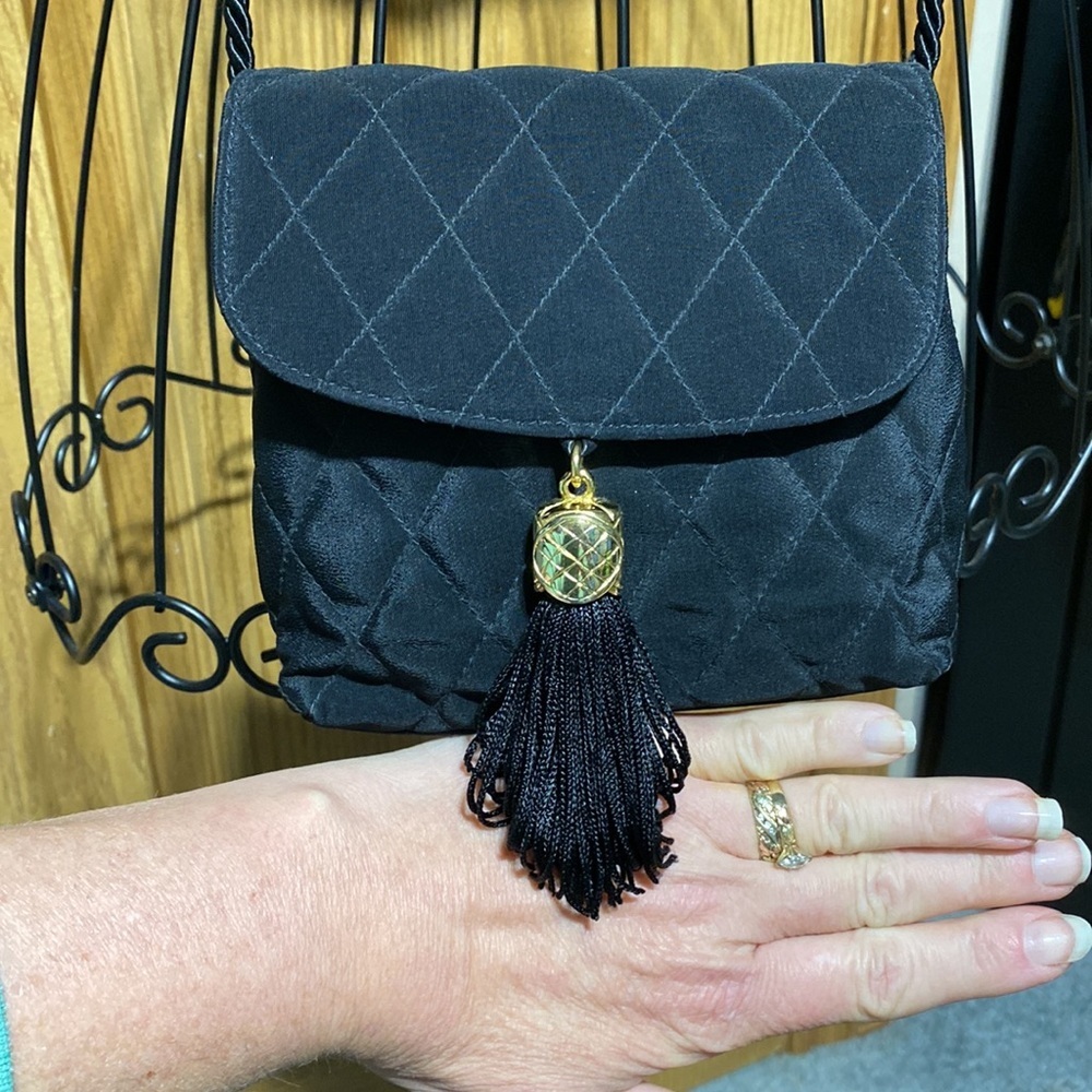 Neiman Marcus Gold Tassel Bag Small
Luxury purse​​ - Picture 6 of 11